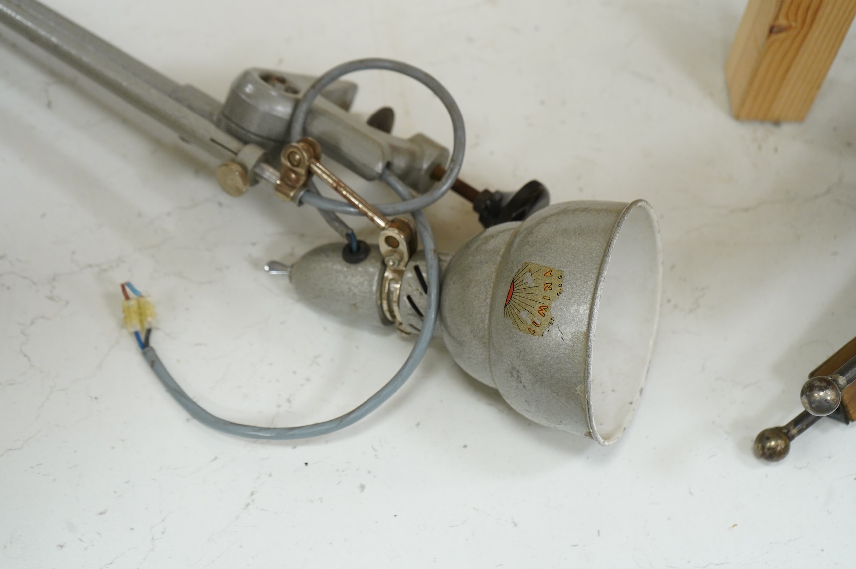 A Lumina industrial folding anglepoise lamp